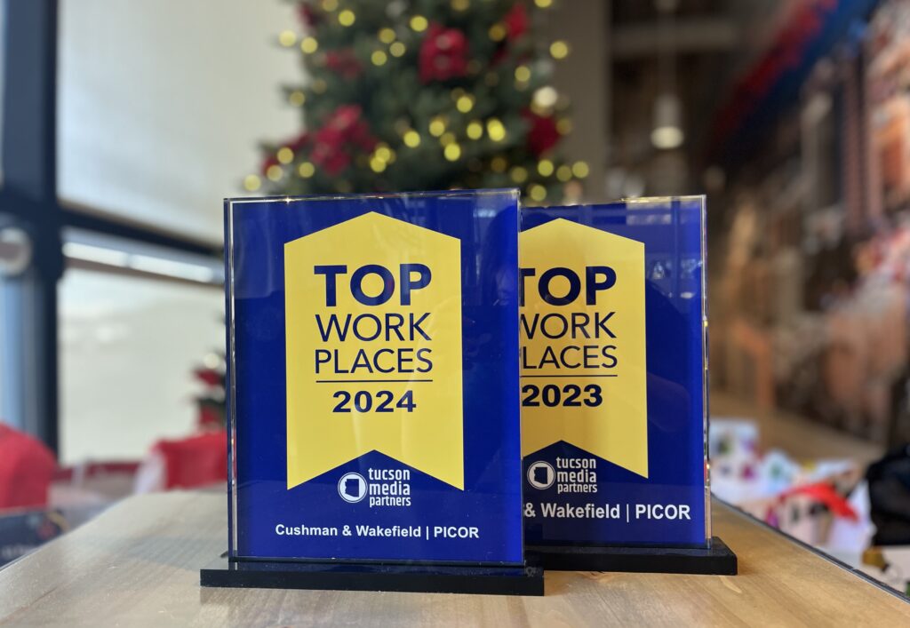 Photo showing 2023 and 2024 Top Work Place Awards